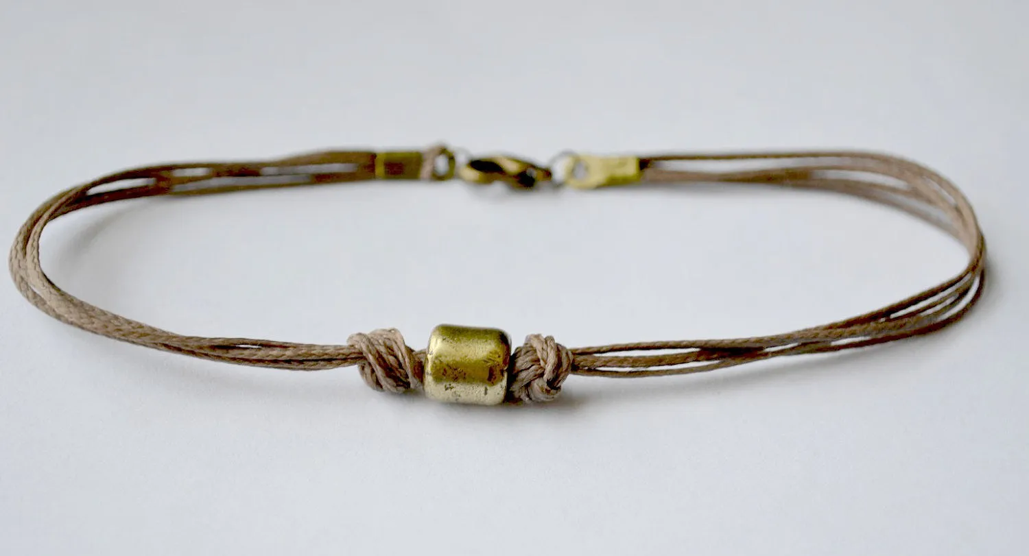 Bronze tube anklet for men, brown cord