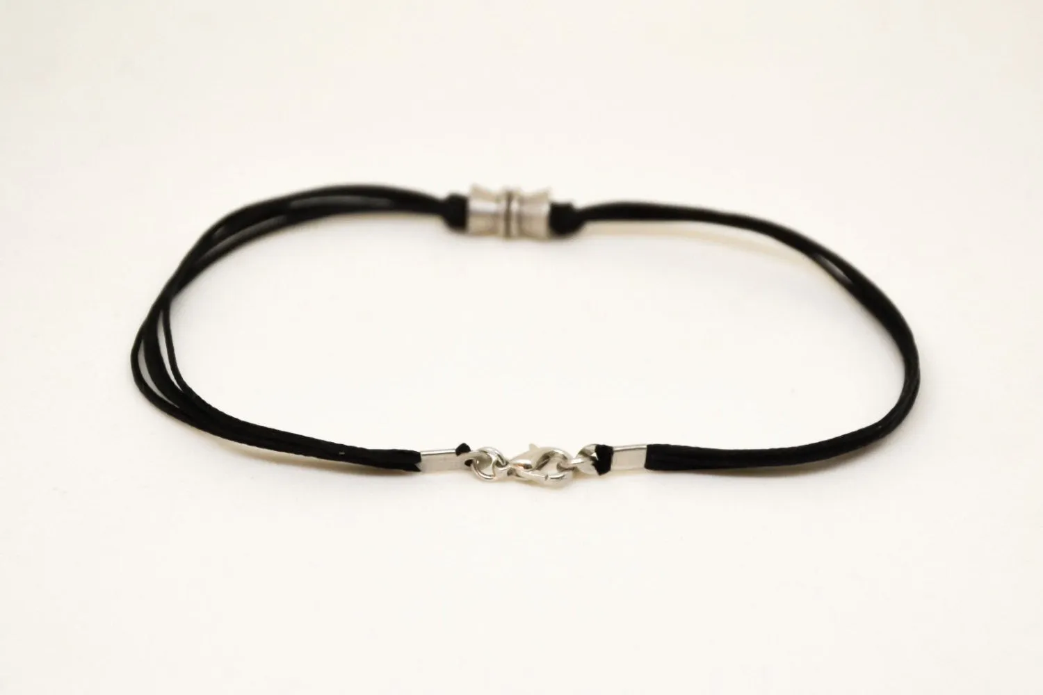 Men's anklet with a silver tube bead charm and a black cord, gift for him