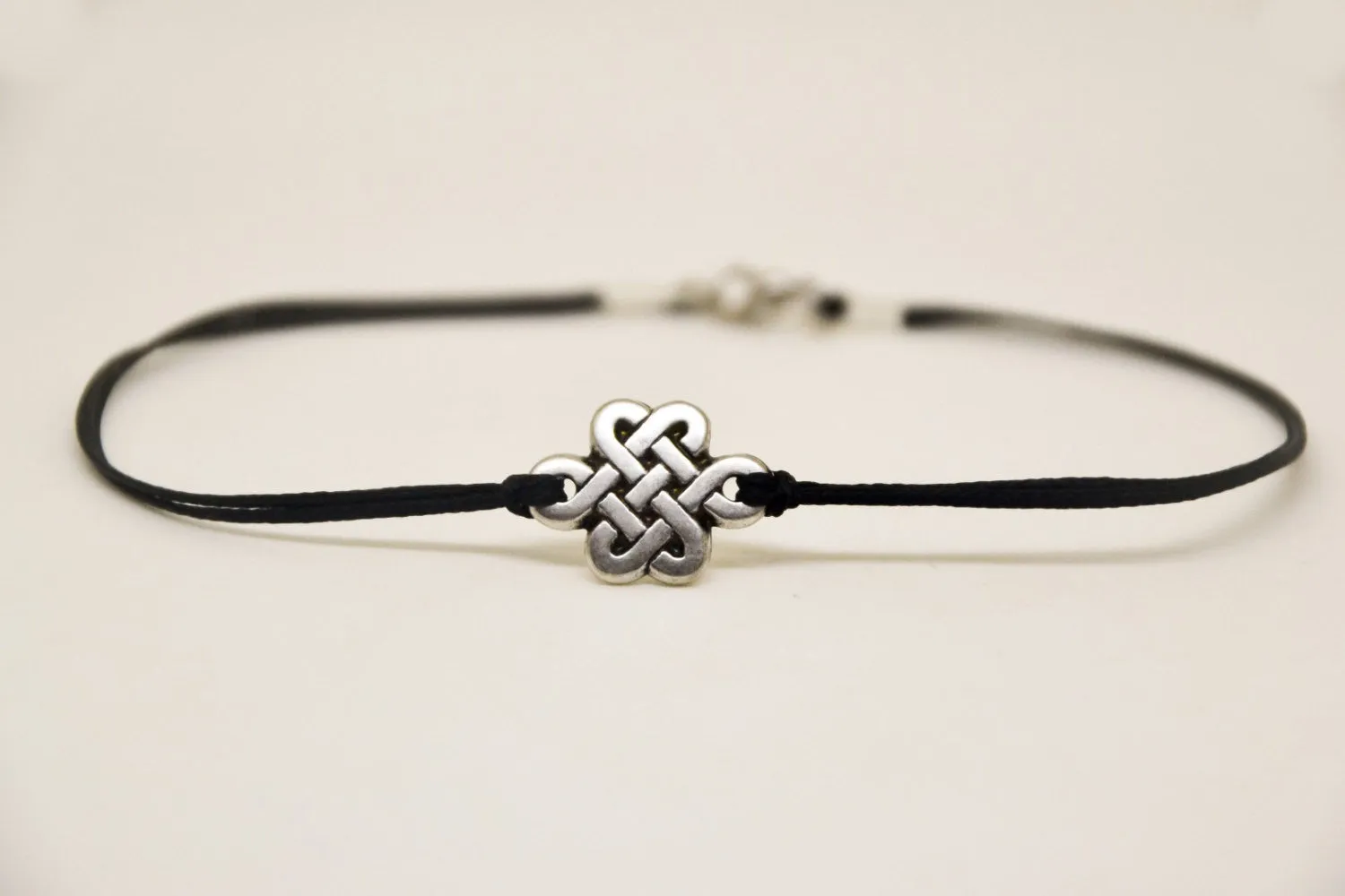 Silver Celtic knot infinity anklet for men, black cord